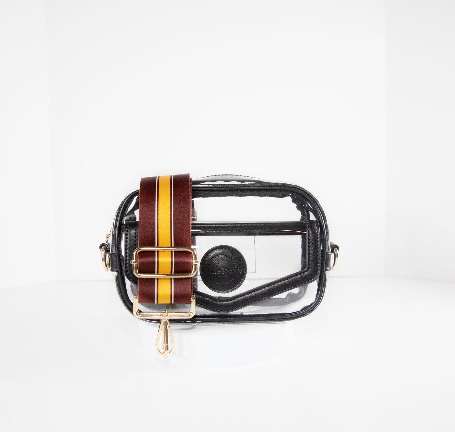 Clear stadium bag in black leather trim, front facing, with a strap in the colors of the Washington Commanders.