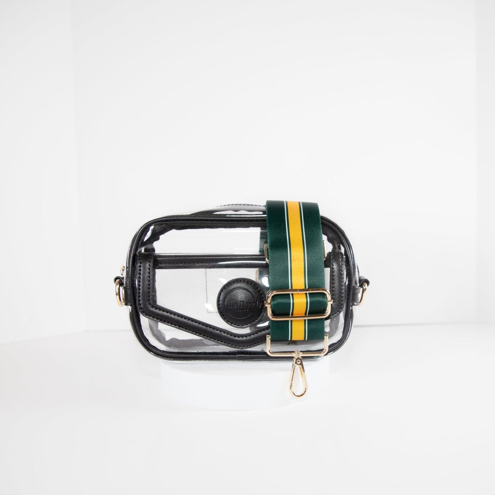 Clear Stadium Bag in black leather trim, front facing, with a strap in the team colors of the Green Bay Packers.