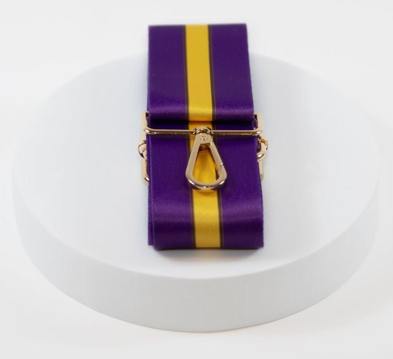 Elegant crossbody strap shown in LSU Tigers team colors of purple and gold.